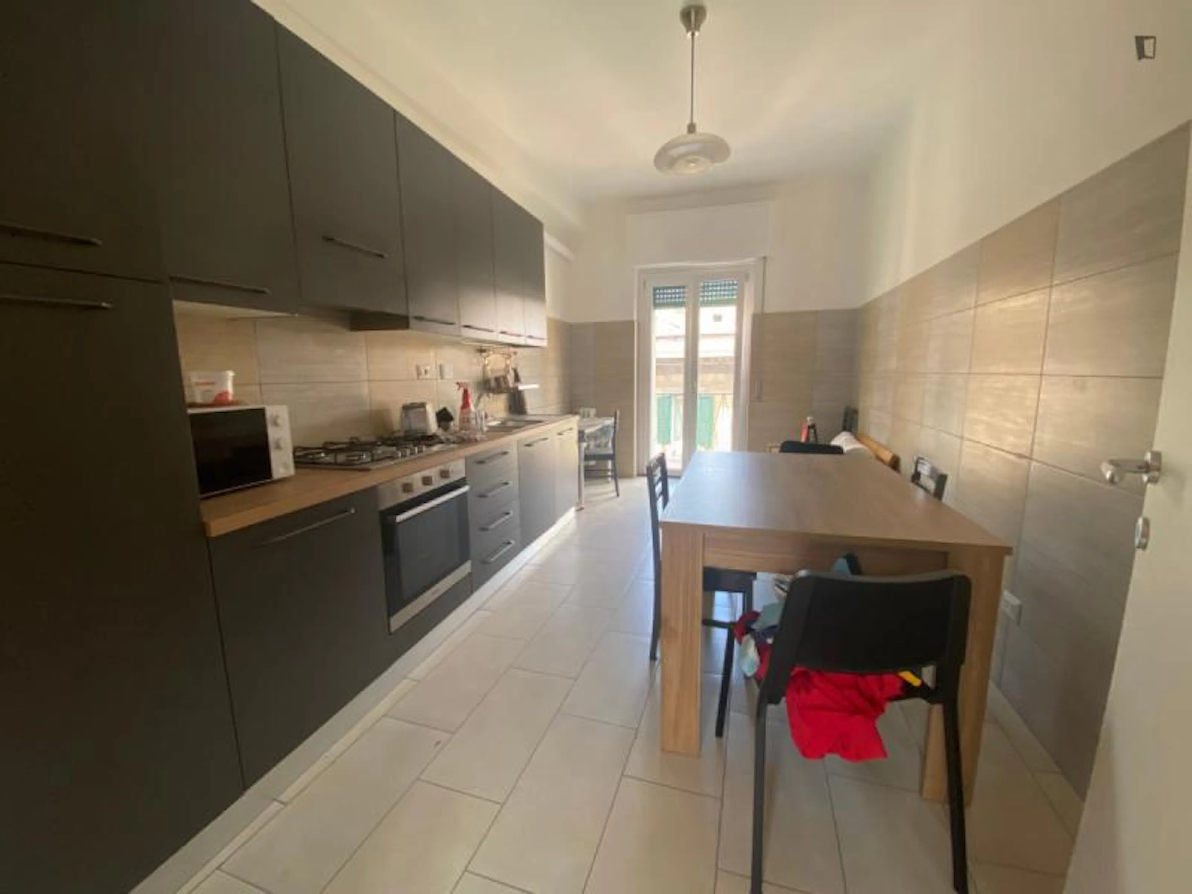 Airy Bedroom in a shared apartment in Rome KITCHEN 3